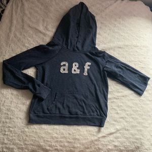 Navy blue sweatshirt with white lettering